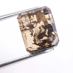 2.95 Ct brown emerald cut lab grown diamond loose stone with rich fancy color and sharp rectangular step facets for custom jewelry