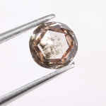 0.51 Ct Round cut White & brown lab created diamond with clean geometric step facets and elegant sparkle