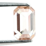 0.60 Ct brown emerald cut lab grown diamond with elegant step cut facets and rich earthy tone, loose fancy diamond for custom jewelry design.