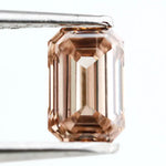 0.60 Ct brown emerald cut lab grown diamond with elegant step cut facets and rich earthy tone, loose fancy diamond for custom jewelry design.
