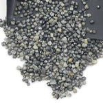assorted natural rough diamonds in varied colors and irregular shapes for custom engagement ring designs