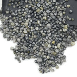 assorted natural rough diamonds in varied colors and irregular shapes for custom engagement ring designs