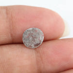 Round lab-grown diamond with unique gray inclusions, faceted for maximum sparkle, ethically created, ideal for custom rings and jewelry