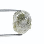 grey colour uncut raw diamond ring and pictures of a raw diamond collection