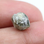 grey colour uncut raw diamond ring and pictures of a raw diamond collection