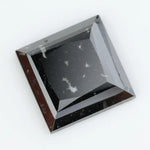 Luxurious square-cut lab-grown black diamond with a stunning, clear polished surface, offering eco-friendly elegance for fine jewelry pieces.