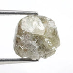 grey colour rough of a raw diamond and pure diamonds collection