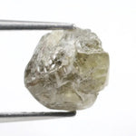 grey colour rough of a raw diamond and pure diamonds collection