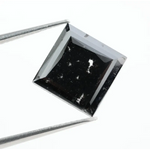 Luxurious square-cut lab-grown black diamond with a stunning, clear polished surface, offering eco-friendly elegance for fine jewelry pieces.