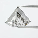 Faceted lab-grown black and white diamond with unique marbled inclusions, perfect for rings, pendants, and ethical jewelry designs.
