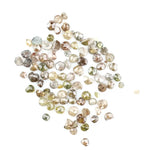 Natural multi colour rough diamonds with yellow, grey, champagne and white tones displayed on white background.