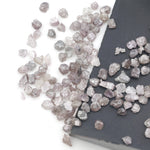 unique pink rough raw diamond with a natural uncut appearance for jewelry design