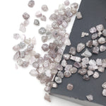 unique pink rough raw diamond with a natural uncut appearance for jewelry design