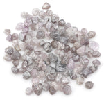unique pink rough raw diamond with a natural uncut appearance for jewelry design