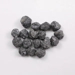 Black Diamond loose stone showcasing deep black color and polished surface for luxury jewelry design