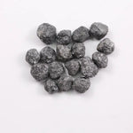 Black Diamond loose stone showcasing deep black color and polished surface for luxury jewelry design