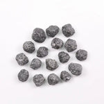 Black Diamond loose stone showcasing deep black color and polished surface for luxury jewelry design