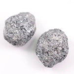 Matching rough gray diamonds with natural uncut crystal texture