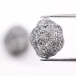 Matching rough gray diamonds with natural uncut crystal texture