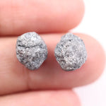 Matching rough gray diamonds with natural uncut crystal texture