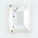 Emerald cut lab grown diamond loose stone with high clarity and subtle natural inclusions, transparent and ethically created for engagement ring or fine jewelry use