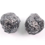 Matching pair of raw gray diamonds is especially rare, making them ideal for custom jewelry designs.