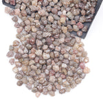 natural brown raw diamond with a distinctive uncut rough appearance for jewelry projects