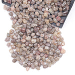 natural brown raw diamond with a distinctive uncut rough appearance for jewelry projects