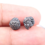 Matching pair of raw gray diamonds is especially rare, making them ideal for custom jewelry designs.
