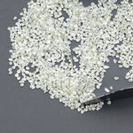 white natural rough crystal stone displayed as a loose uncut raw piece