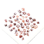 Rare natural fancy red and brown rose cut diamond mixed shapes earth mined loose diamond for custom jewelry, artisan rings, and unique engagement ring designs.