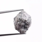 Grey diamond ring with a sophisticated, smoky grey stone, set in white gold, highlighting its elegant and unique aesthetic.