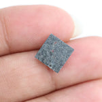 Square cut lab-grown diamond with exceptional clarity and brilliance, perfect for engagement rings, showcasing sustainable and ethical craftsmanship.