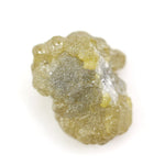 1.18 carat yellow raw diamond with a natural unpolished surface for a custom gold ring setting