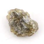 1.52 carat yellow natural diamond in its unpolished form for creating leaf-style jewelry designs.