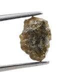 1.52 carat yellow natural diamond in its unpolished form for creating leaf-style jewelry designs.
