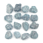 natural blue color rough diamond pieces arranged in an uncut loose diamond lot