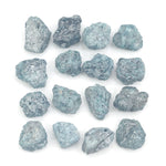 natural blue color rough diamond pieces arranged in an uncut loose diamond lot