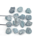 natural blue color rough diamond pieces arranged in an uncut loose diamond lot