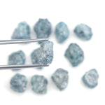 natural blue rough diamond pieces in a loose uncut raw diamond collection