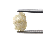 1.09 carat yellow natural rough diamond, an untreated loose stone for a gold engagement ring setting.