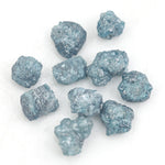blue natural rough diamond pieces displayed for engagement ring and jewelry projects