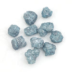 blue natural rough diamond pieces displayed for engagement ring and jewelry projects