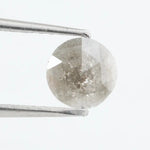 Round-cut salt and pepper lab-grown diamond with unique natural inclusions, ethically created for custom engagement rings and fine jewelry