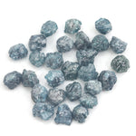 natural blue rough diamond with a raw uncut diamond for engagement jewelry