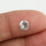 Round-cut salt and pepper lab-grown diamond with unique natural inclusions, ethically created for custom engagement rings and fine jewelry