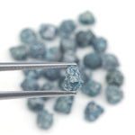 natural blue rough diamond with a raw uncut diamond for engagement jewelry