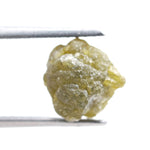 natural yellow uncut diamond with a rugged surface, suitable for designing a distinctive custom ring.