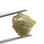 natural yellow uncut diamond with a rugged surface, suitable for designing a distinctive custom ring.