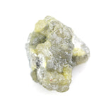 unpolished yellow natural diamond with a rough exterior, selected for creating distinctive gold fine jewelry pieces.